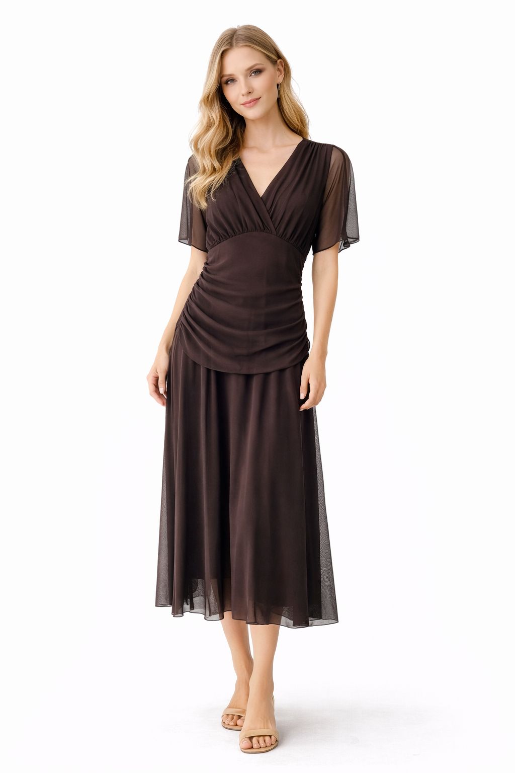 Vestido midi con escote cruzado en pico y manga corta semitransparente. Presenta cintura fruncida que estiliza la silueta y falda fluida con caída ligera, ideal para un look elegante y cómodo. 